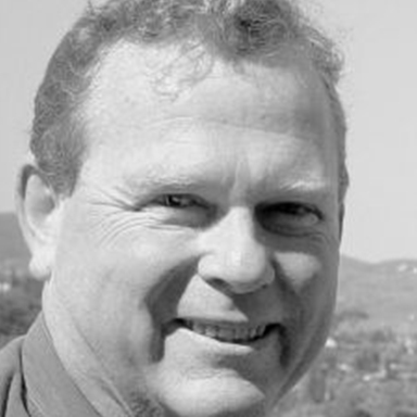 A headshot of Geoff Huston. 