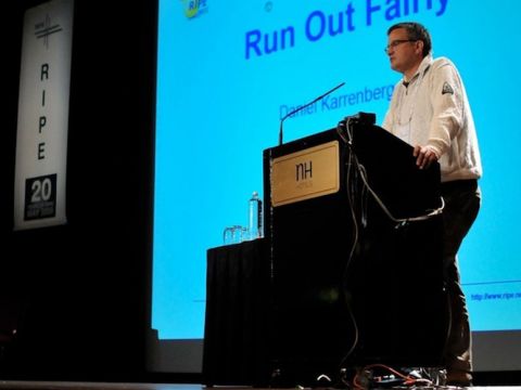Daniel Karrenberg speaking at the conference.