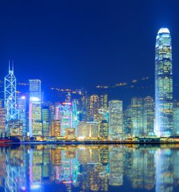 A picture of Honk Kong at night. 