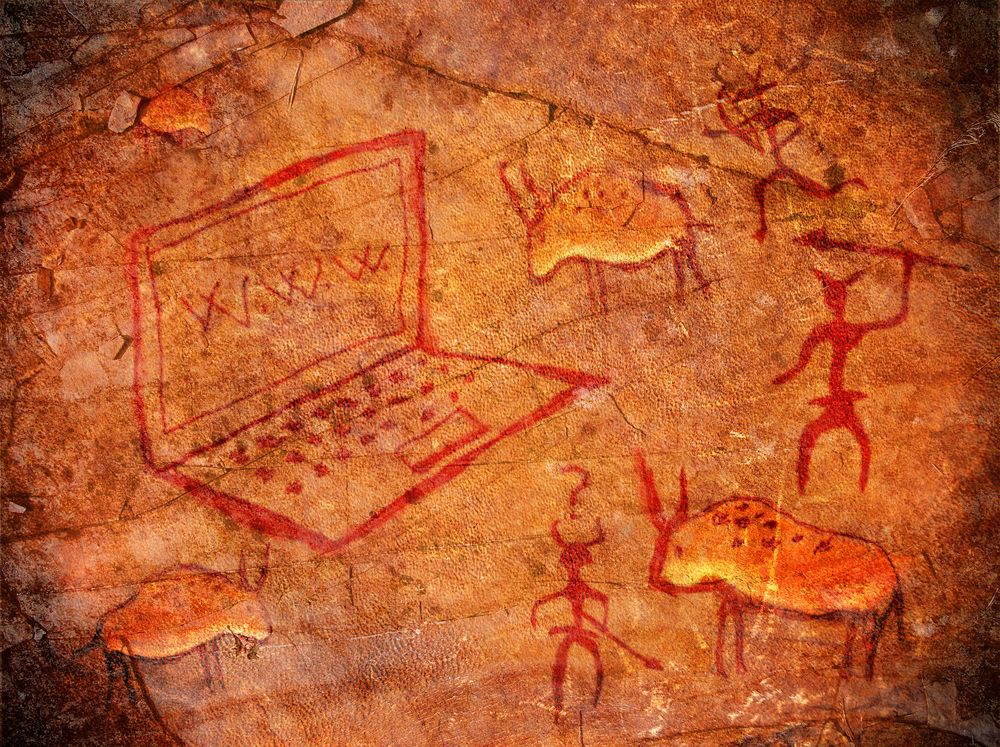 Drawing in the cave showing laptop with WWW inscription on it.