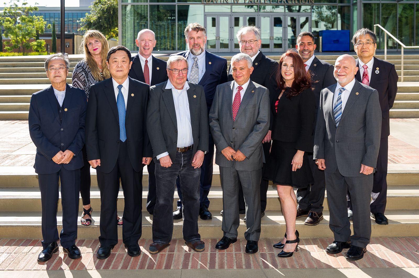 A picture of twelve people, 2017 Hall of Fame inductees.