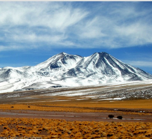 A picture of mountain covered with snow.