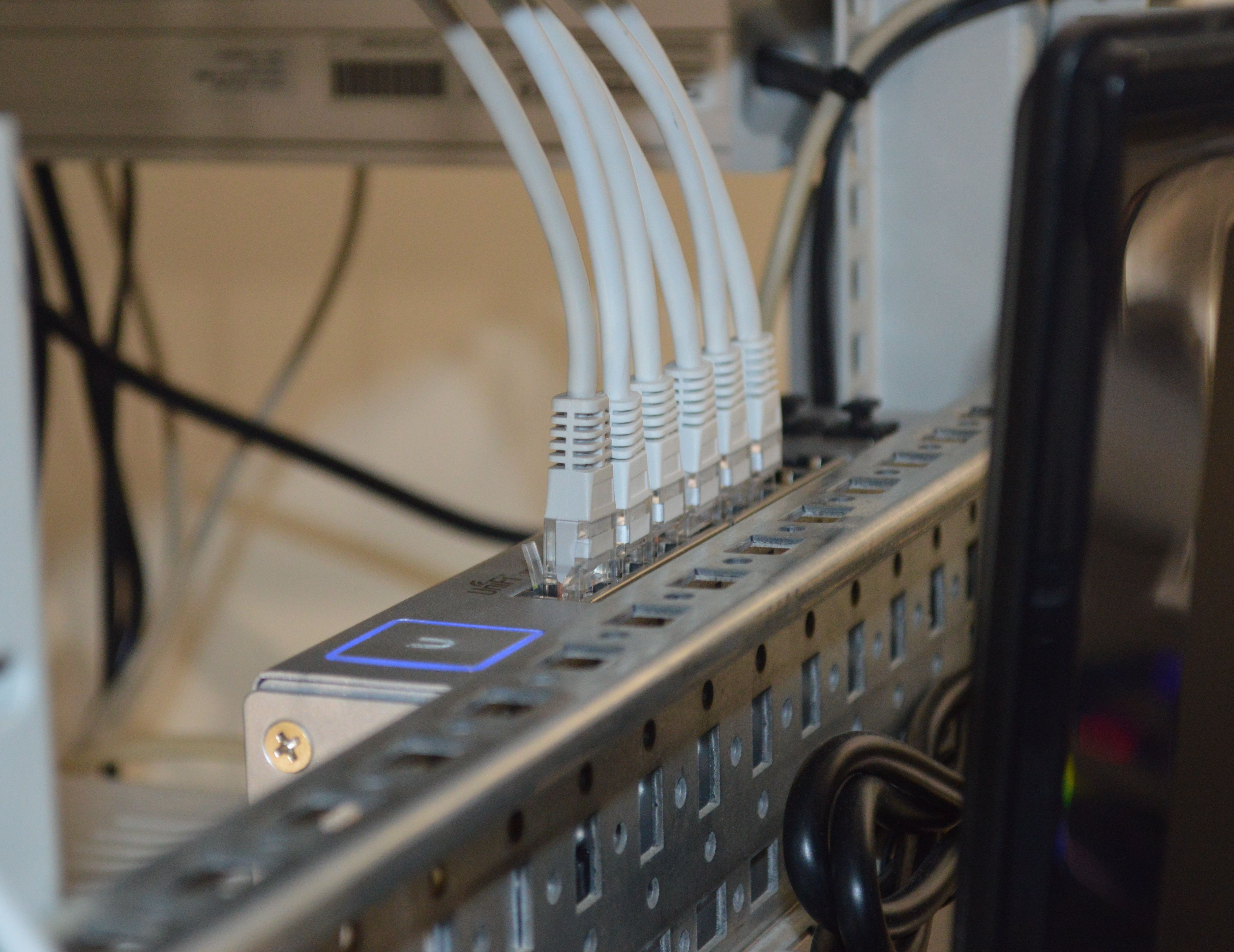 A picture of cables inserted into computer component.