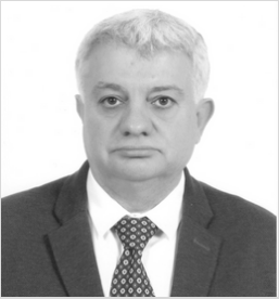 A headshot of Nabil Bukhalid.