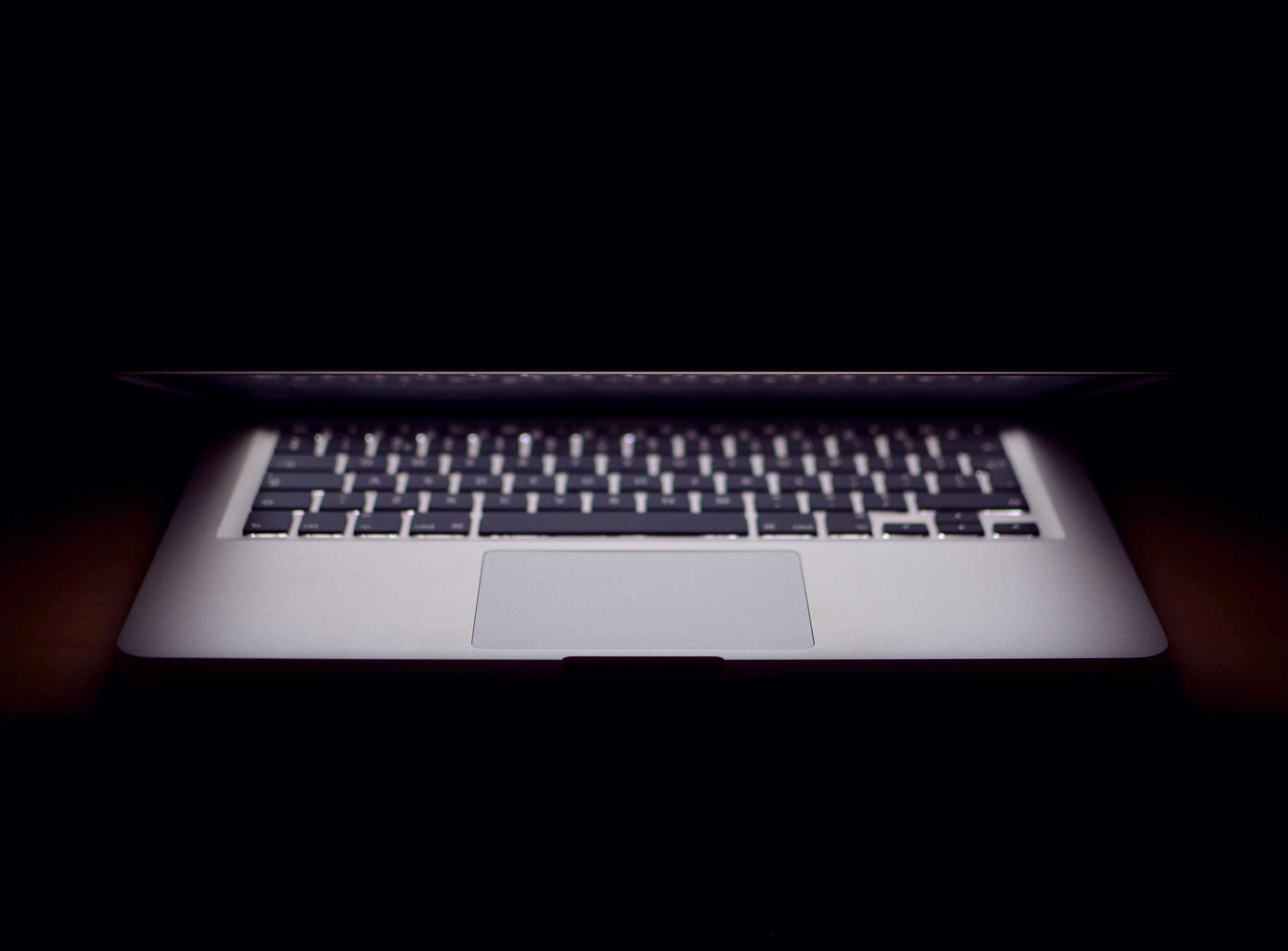 A picture of a laptop semi closed.