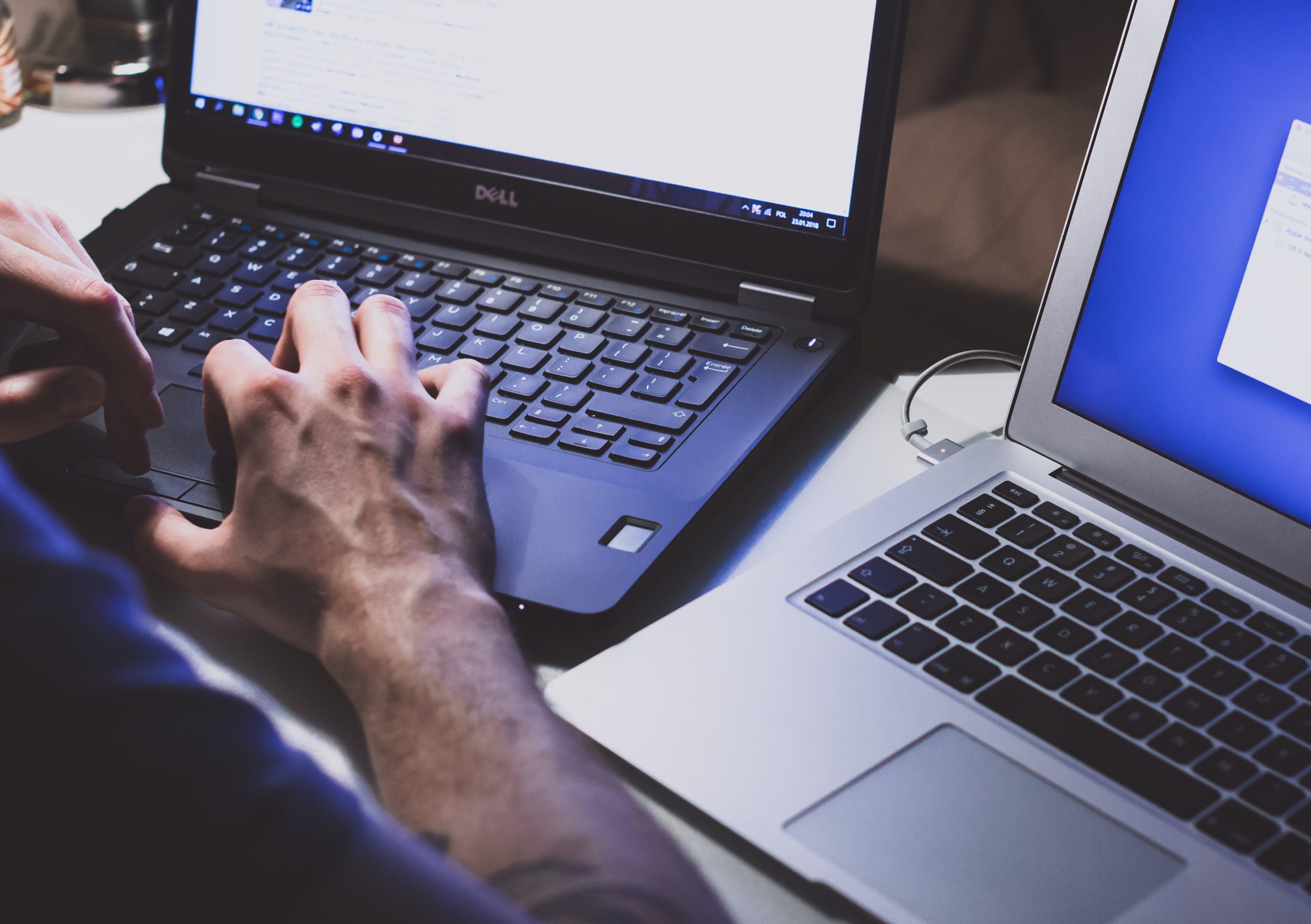 Person typing on a laptop