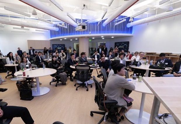 groups of people sitting at tables