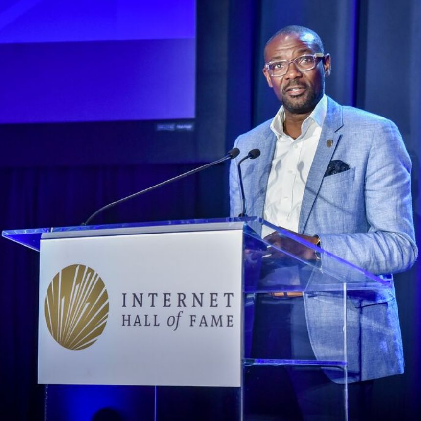 a man gives speech at ceremony