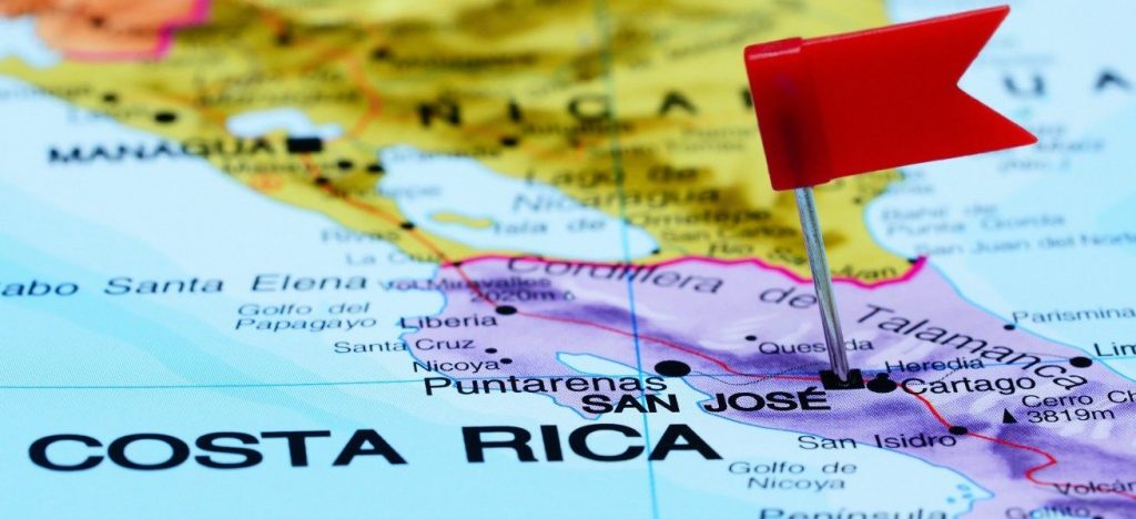 a red flag pointing to San Jose in Costa Rica on a map