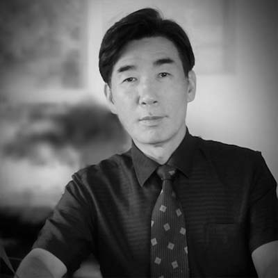 a man in a shirt and tie