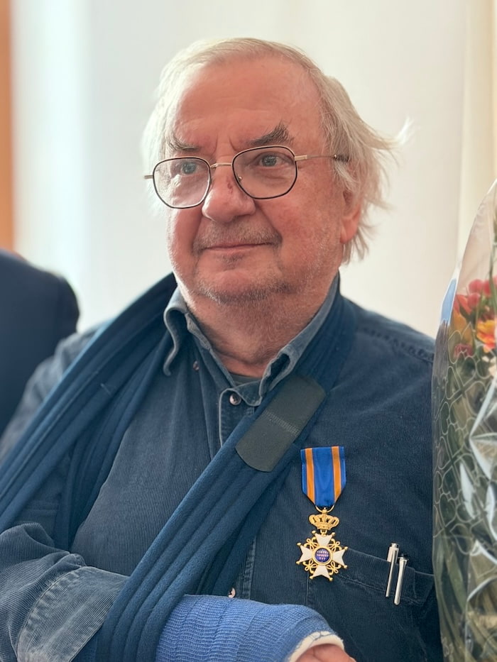 a man decorated with the Order of the Dutch Lion star
